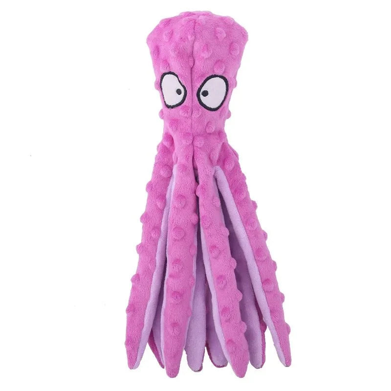 Octopus piepspeelgoed hond roze, frontaal op witte achtergrond — licht paarse tentakels met noppen