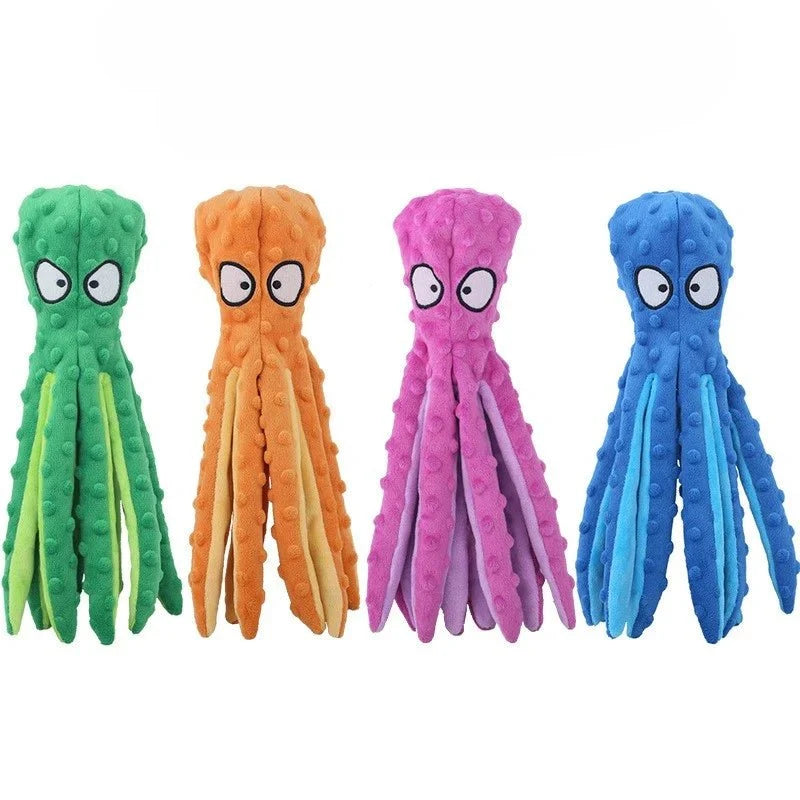 Octopus piepspeelgoed hond vier kleuren rechtop — groen, oranje, roze en blauw in rij op wit