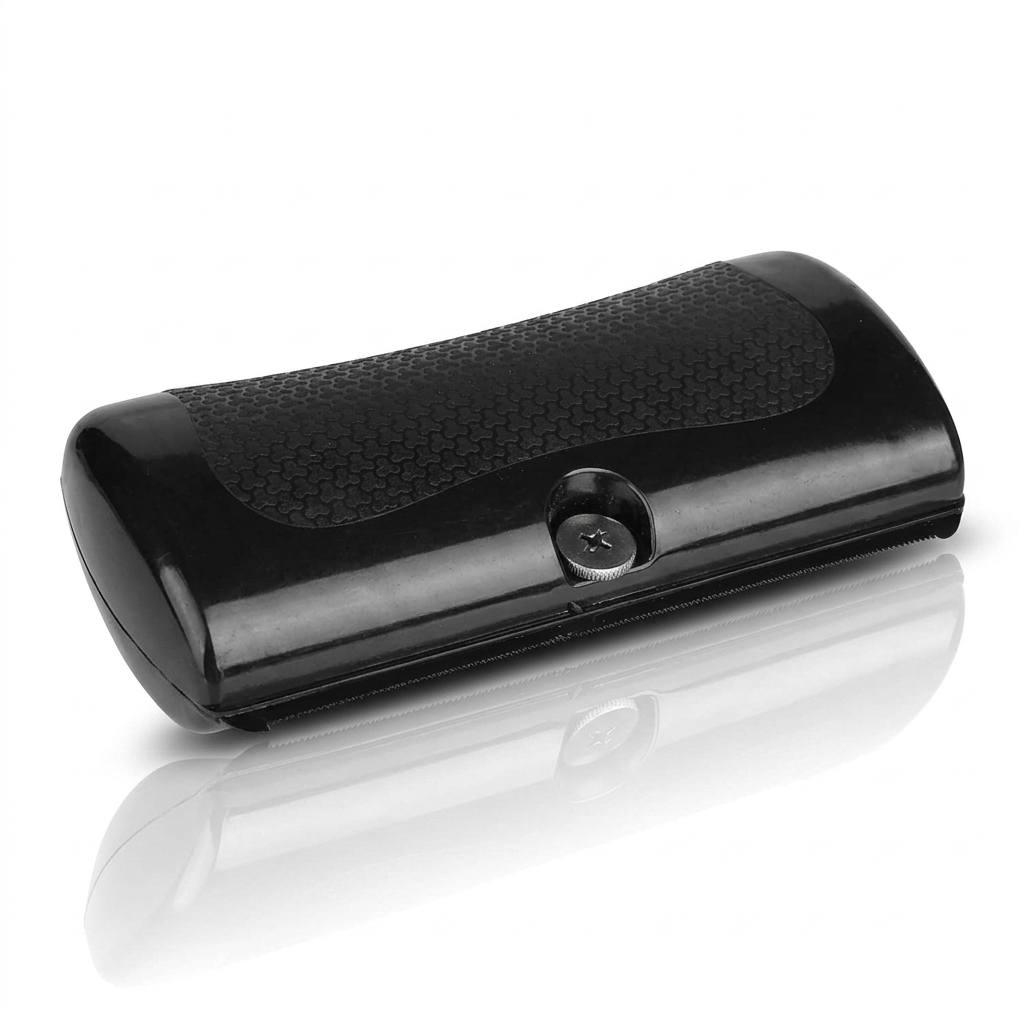 GlowBrush deshedding kam hond en kat — zwarte compacte borstel op witte achtergrond met spiegeling